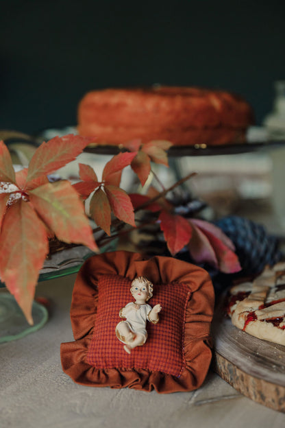 Niño Jesús Almohadita Volante - Emaús Terracota